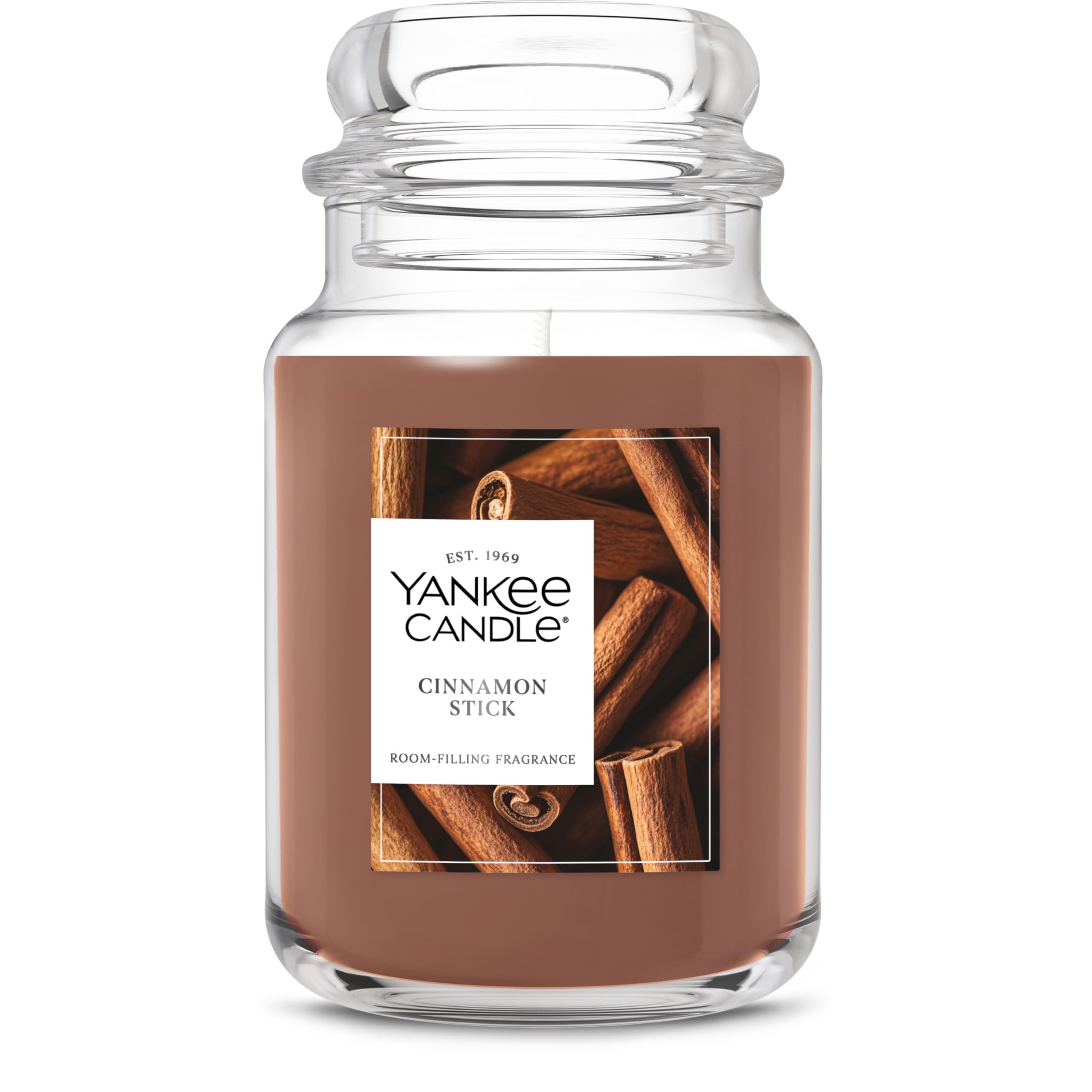 Yankee Candle front jar showing cinnamon stick label and warm scent benefit
