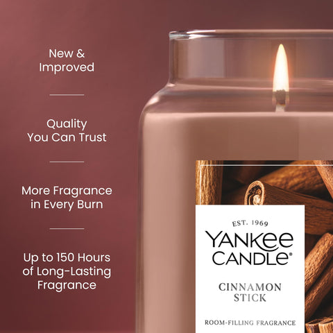 Lit Yankee Candle in living room delivering Yankee Candle long-lasting fragrance