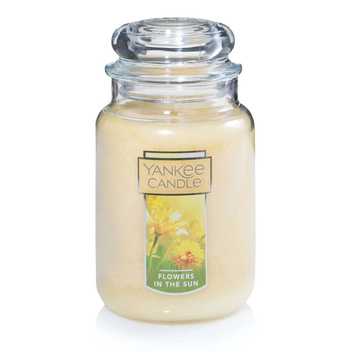 Yankee Candle front view showing jar and lid, bright floral scent benefit