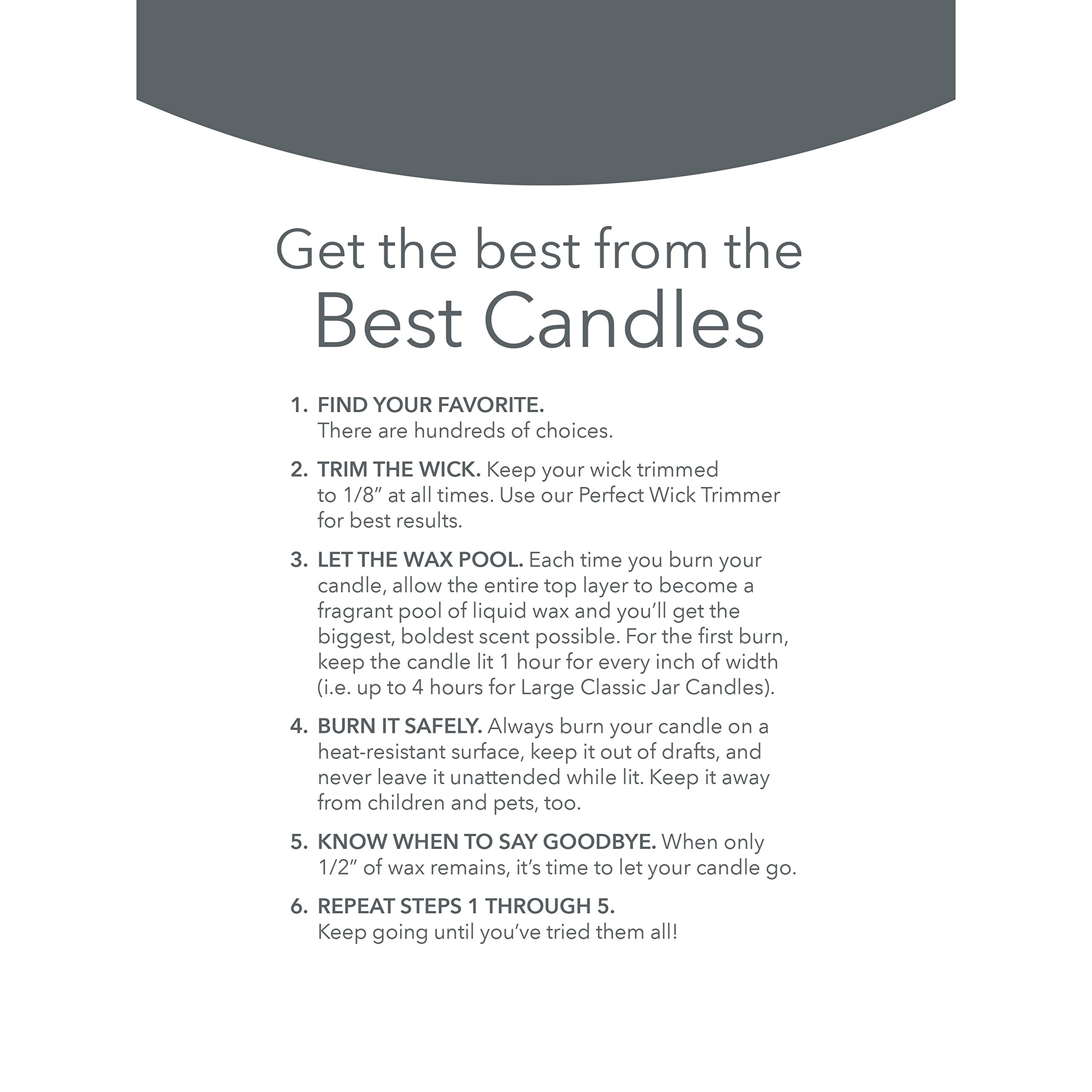 Yankee Candle placed on table in living room, fills space with welcoming scent benefit