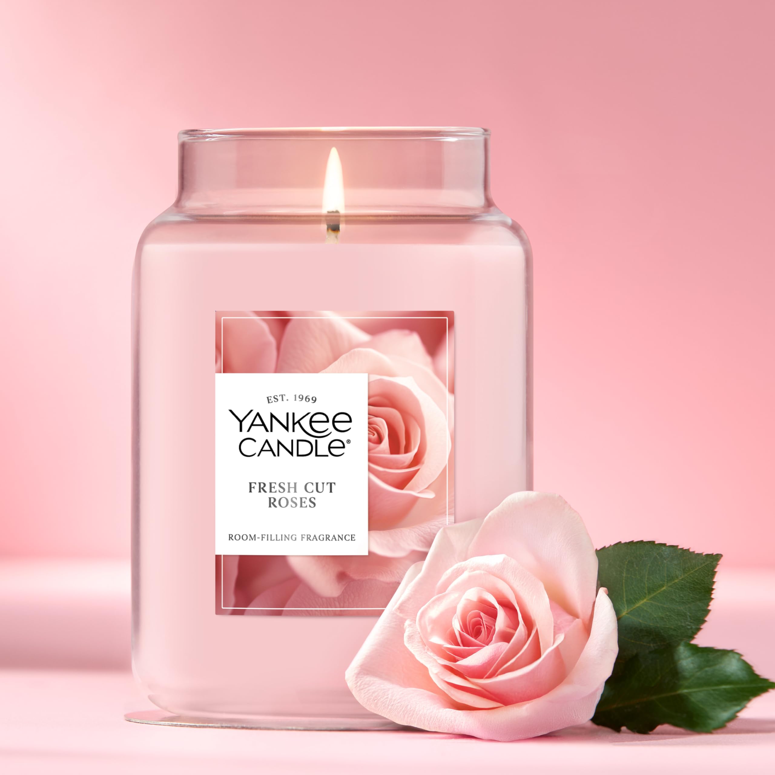 Yankee Candle lit wick and small flame demonstrating clean burn and benefit of reduced soot