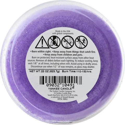 Yankee Candle lilac blossoms on dining table setting, enhancing mealtime and seasonal decor