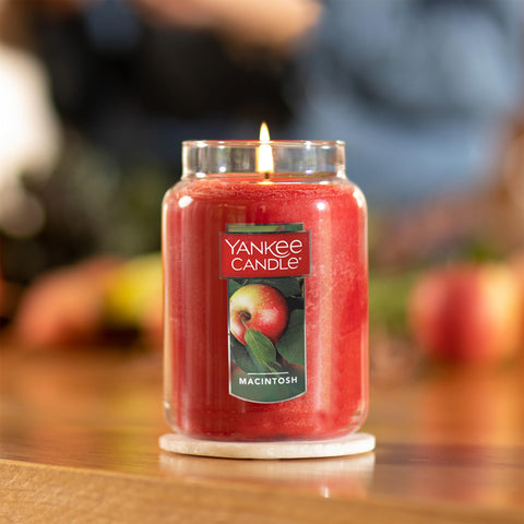Yankee Candle Macintosh close-up of natural-fiber wick and wax, ensures even burn