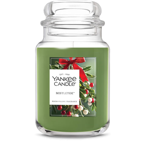 Yankee Candle front jar showing mistletoe scent and long burn benefit
