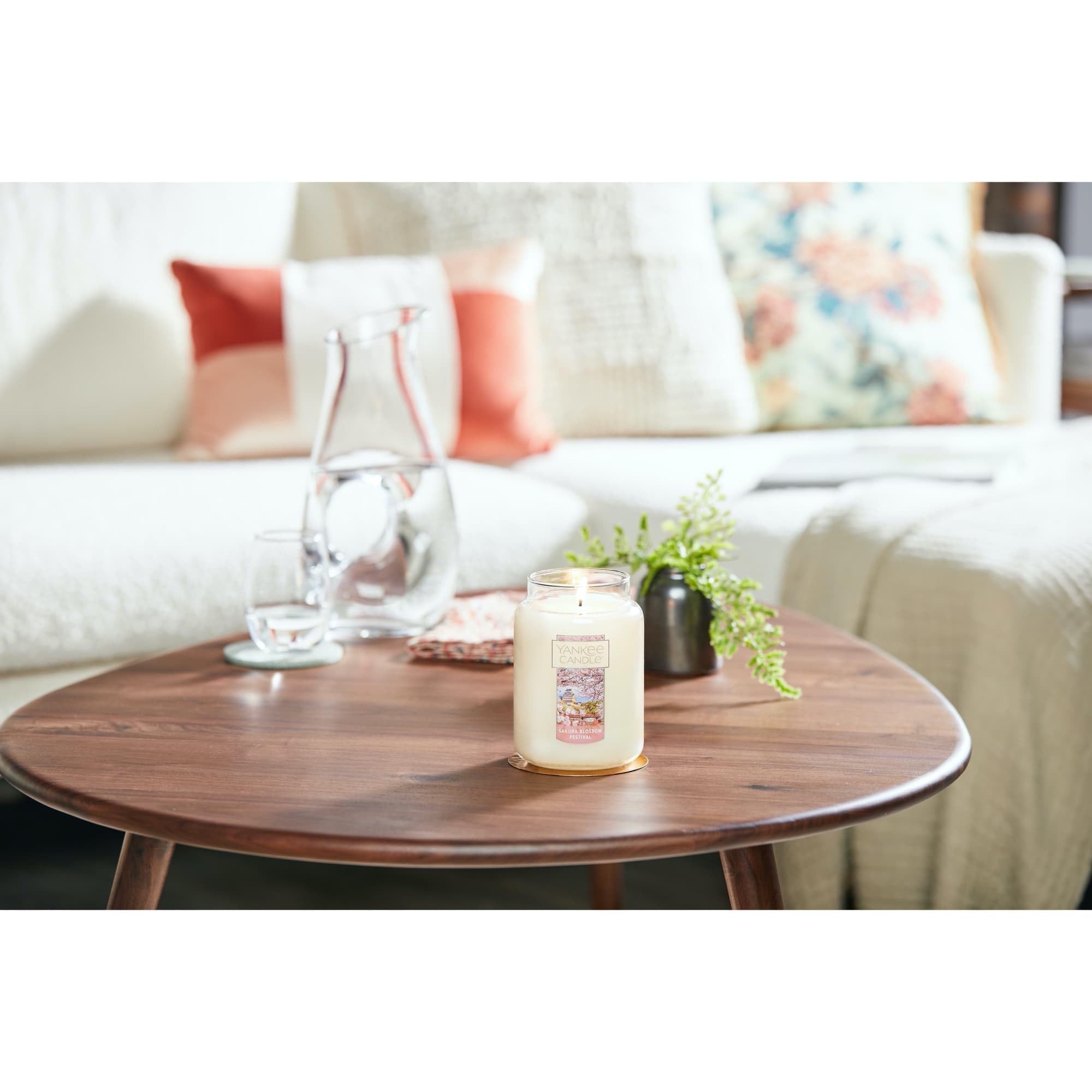Yankee Candle lit Sakura Blossom jar candle setting a warm, inviting atmosphere