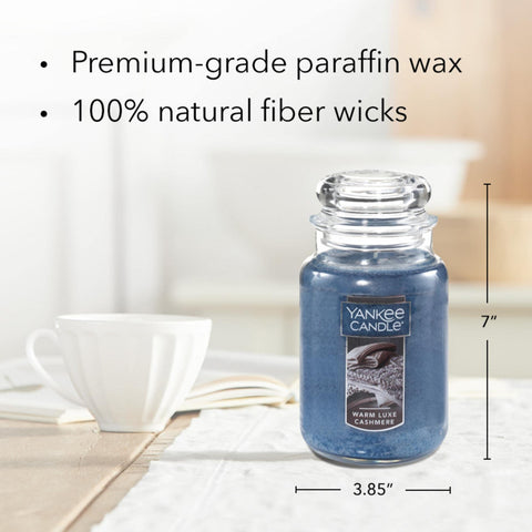 Yankee Candle close-up of Warm Luxe Cashmere label highlighting premium print benefit: craftsmanship