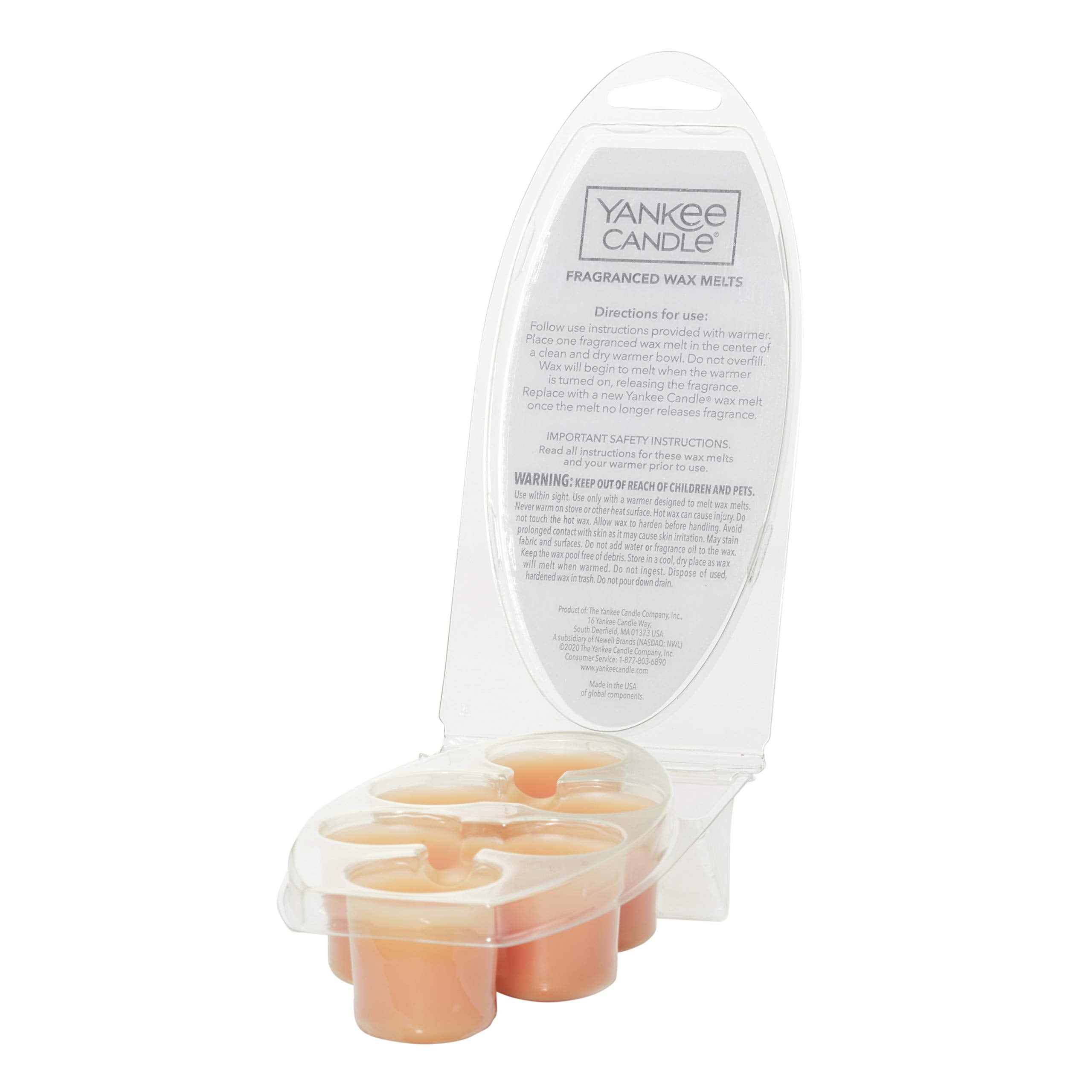 Yankee Candle wax melts in warmer setting creating a warm scented atmosphere