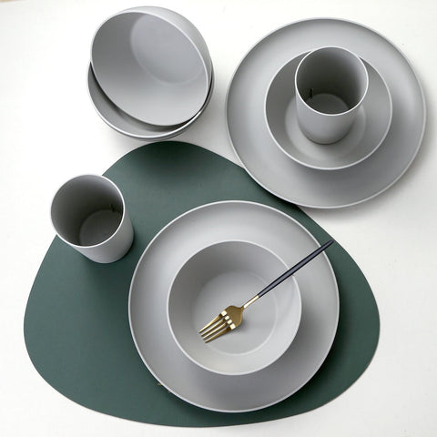 Yarrggu table setting at a party showing stylish gray dinnerware enhancing decor