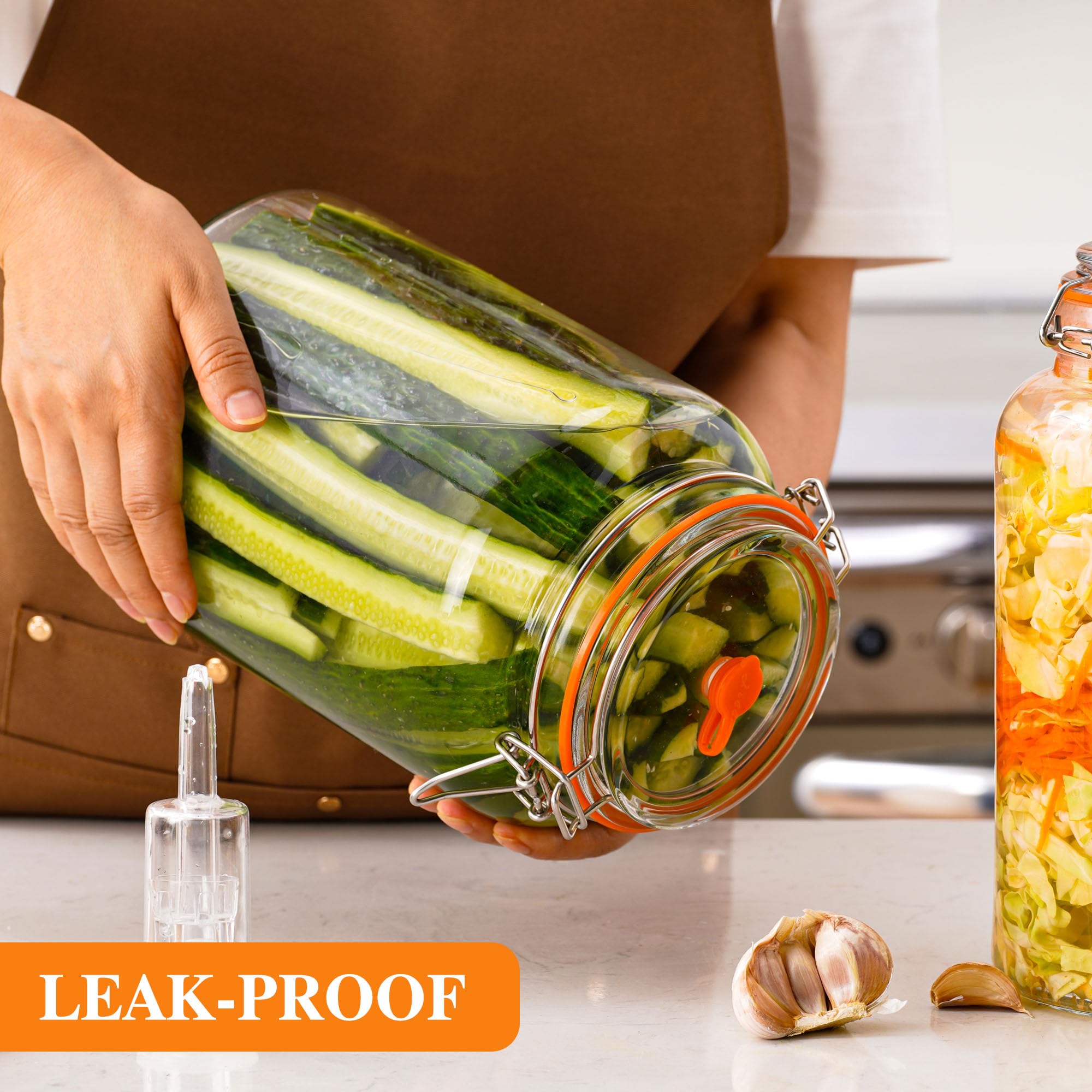 YARWELL jar held by hand for scale, shows true 1-gallon capacity