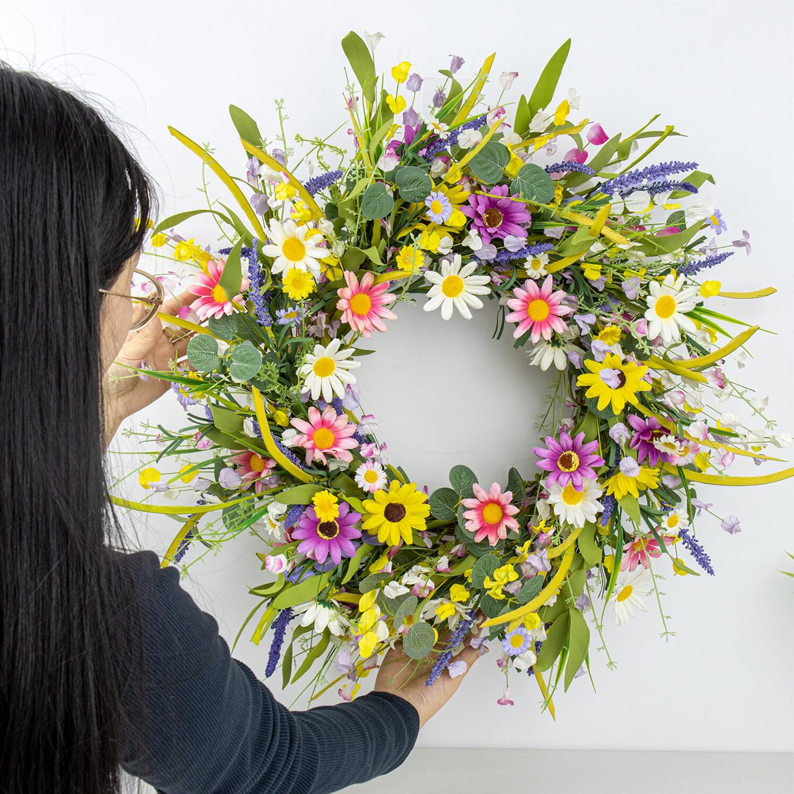 Yawwind wreath hanging on a front door adding welcoming curb appeal