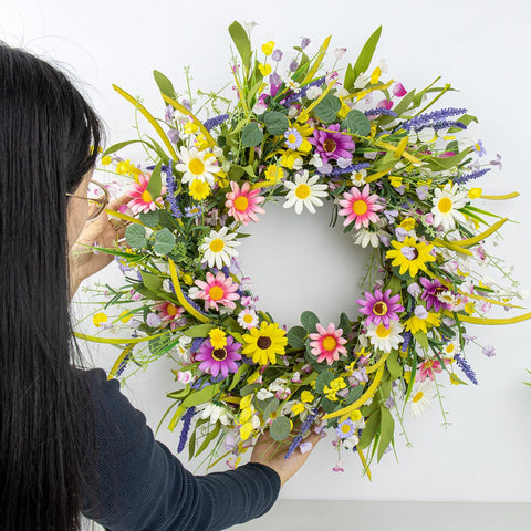 Yawwind wreath hanging on a front door adding welcoming curb appeal
