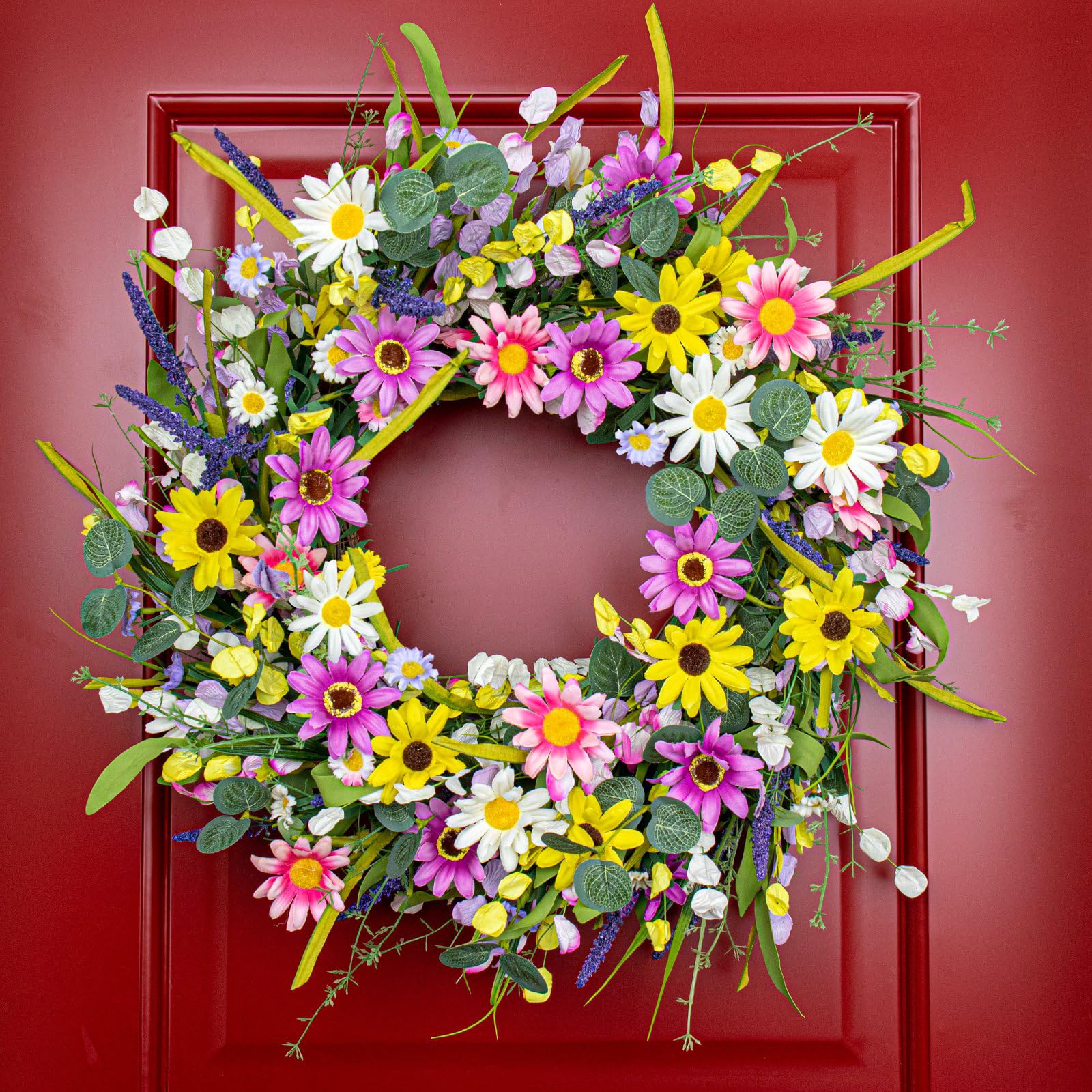 Yawwind wreath next to chair to show size and scale for placement