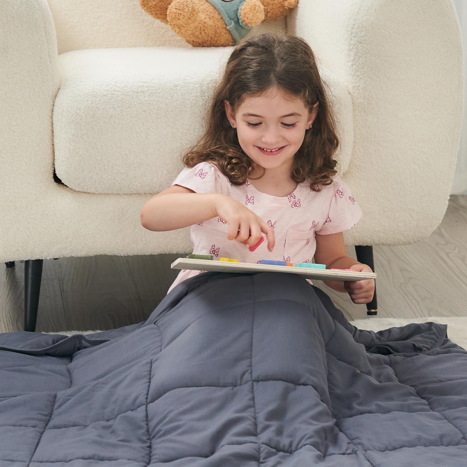 yescool blanket laid on bed showing fit on single bed benefit: compact warming layer