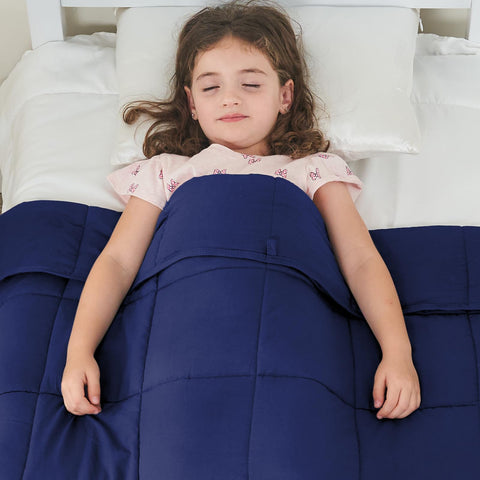 yescool blanket in use on couch with person, demonstrates relaxing at-home comfort