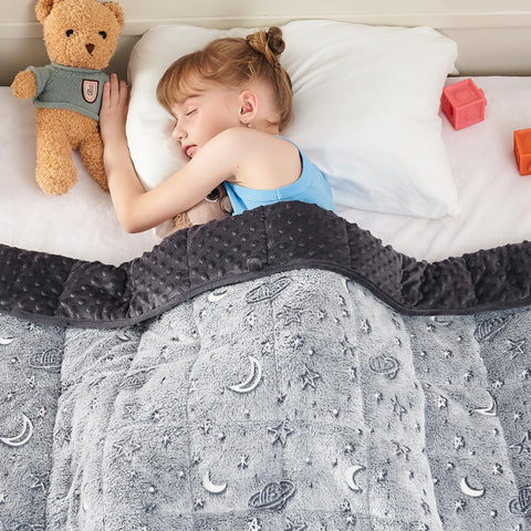 yescool blanket styled on bed, inviting sensory-friendly setup