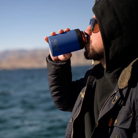 YETI Colster held in hand to show scale and portable convenience