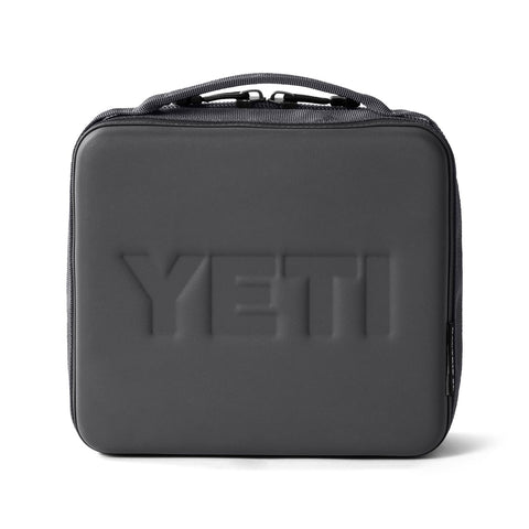 YETI Daytrip 3L inside backpack to show compact scale and portability