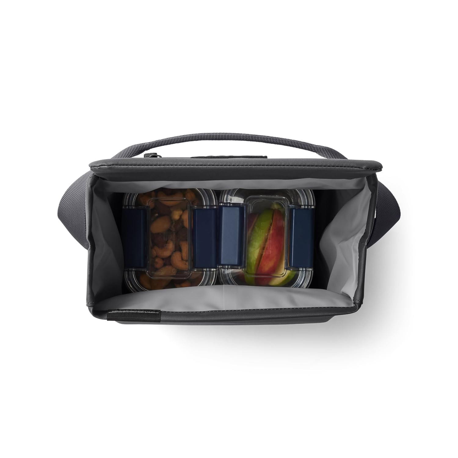 YETI Daytrip 6L lifestyle picnic setting showing reliable cooling outdoors