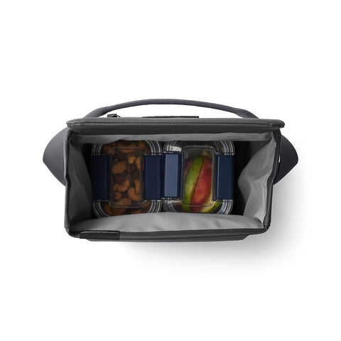 YETI Daytrip 6L lifestyle picnic setting showing reliable cooling outdoors