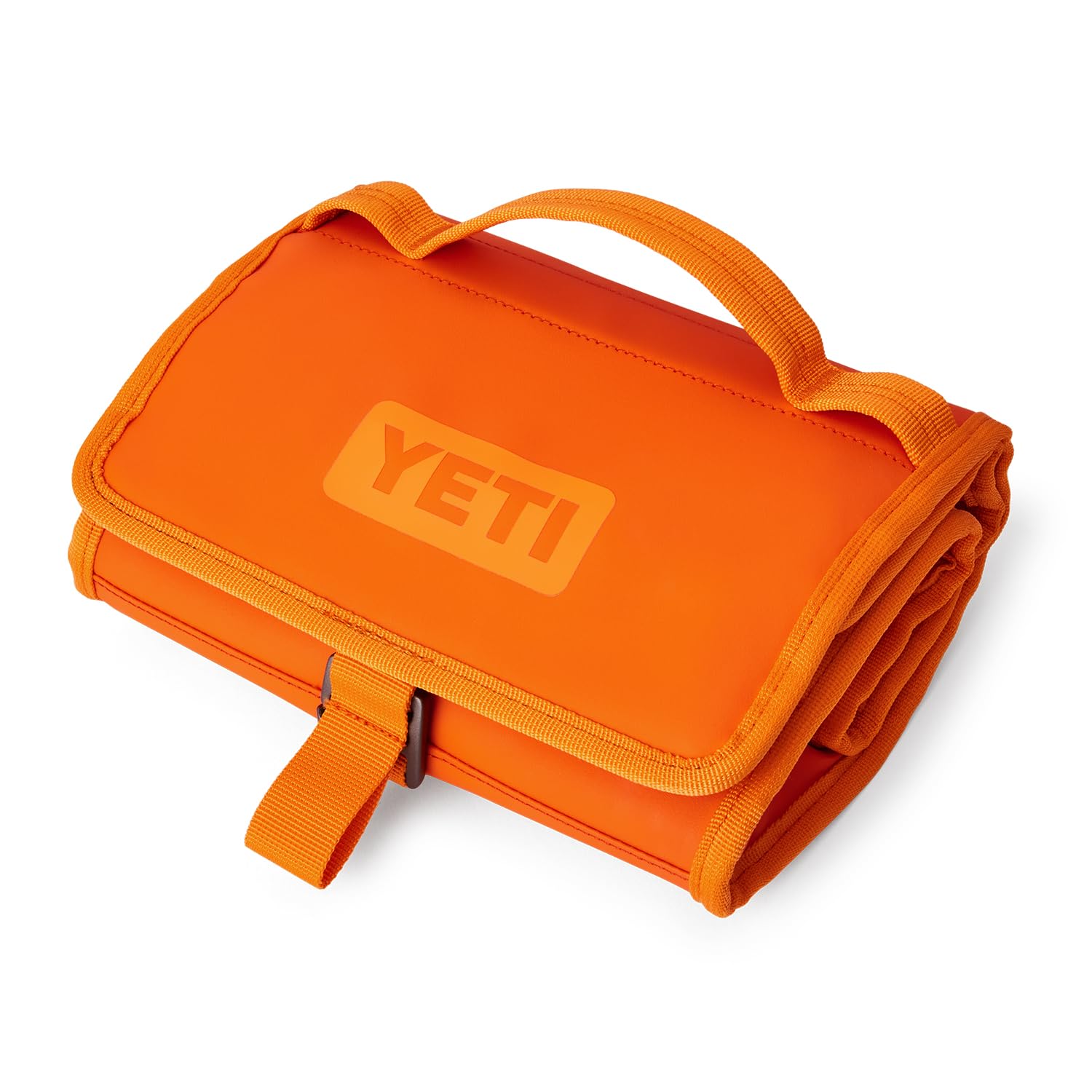 YETI Daytrip next to water bottle showing compact capacity