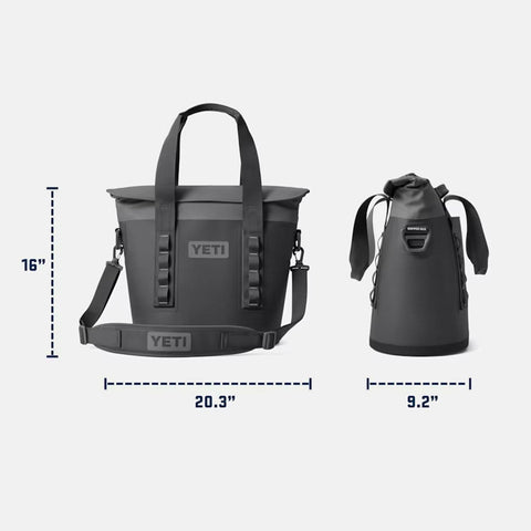 YETI Hopper M15 next to a backpack to illustrate size and travel-friendly capacity