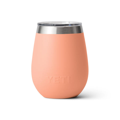 Person holding YETI Rambler Lowcountry Peach showing comfortable grip on the go