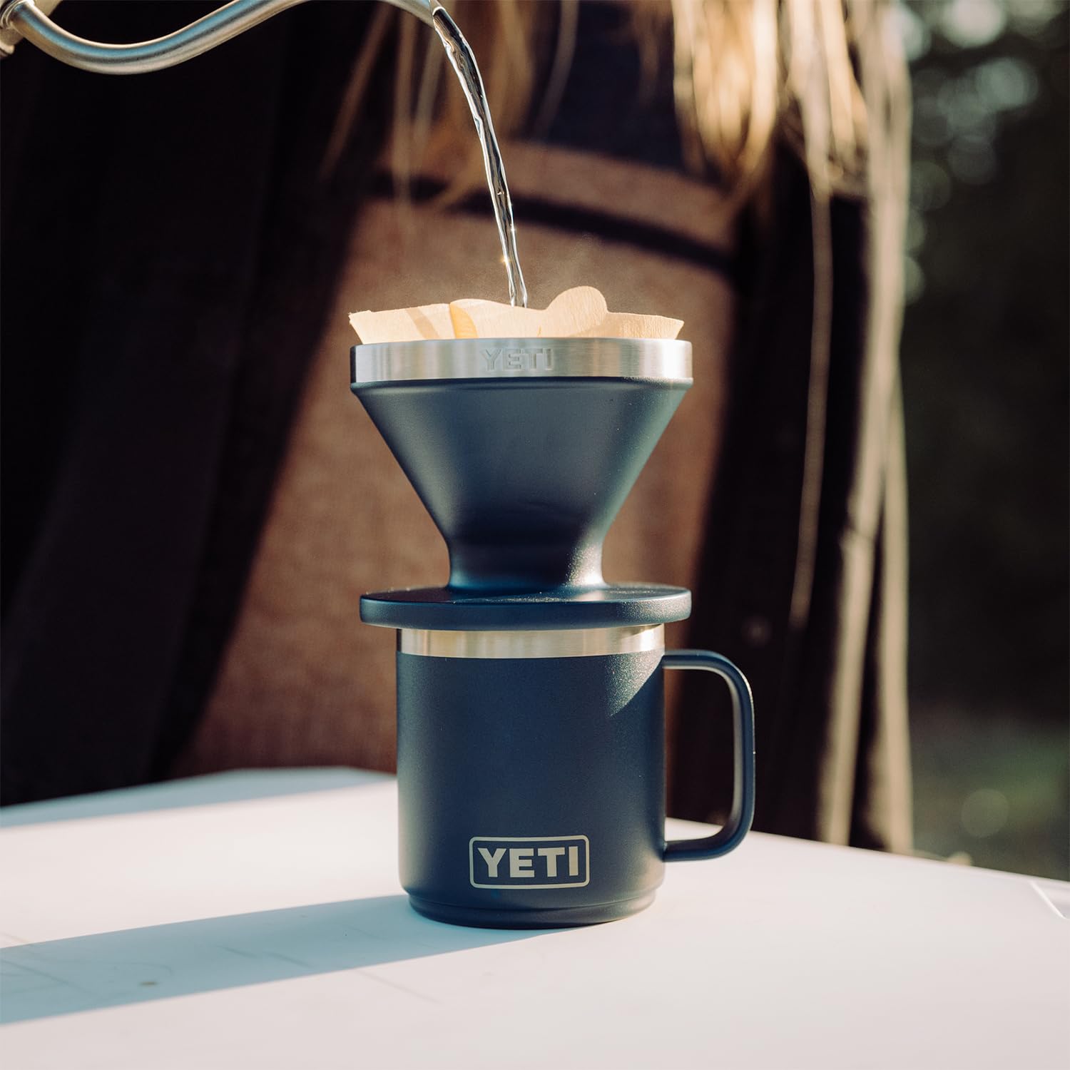 YETI stackable storage shot with multiple Ramblers, space-saving organization