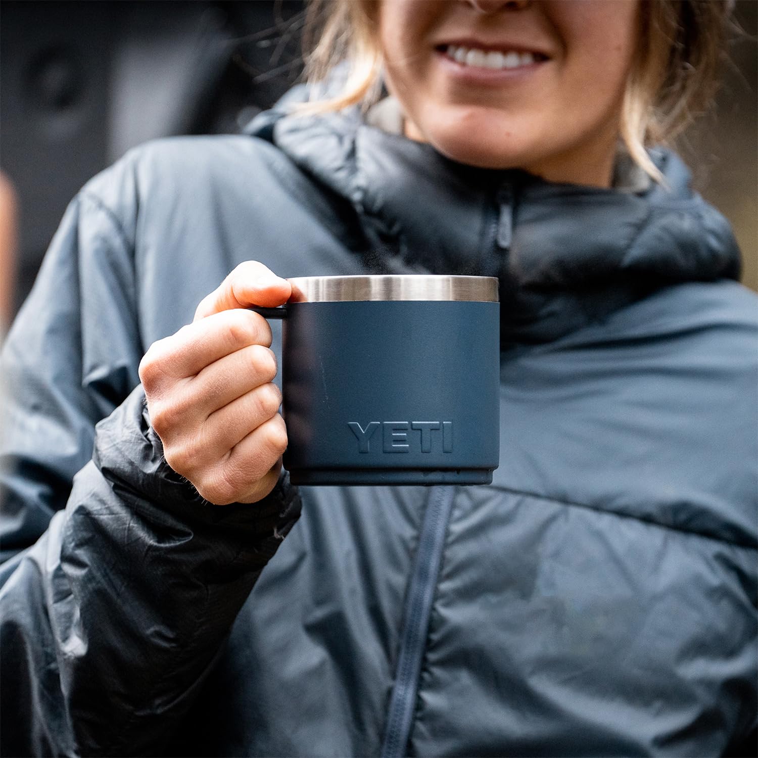 YETI Rambler in campsite setting illustrating durability and temperature retention outdoors