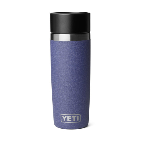 YETI Rambler in a backpack pocket lifestyle shot showing travel-ready convenience