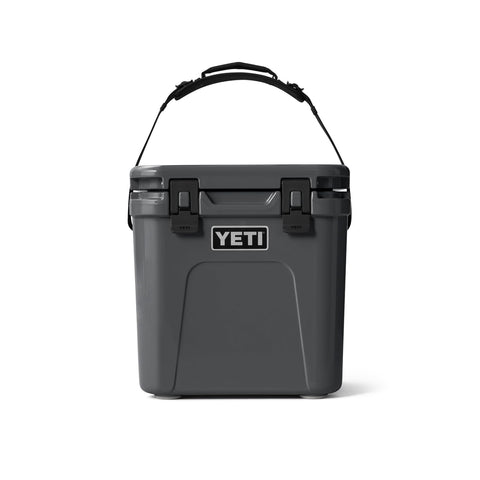 YETI Roadie 24 at a tailgate showing durable design and convenience in use