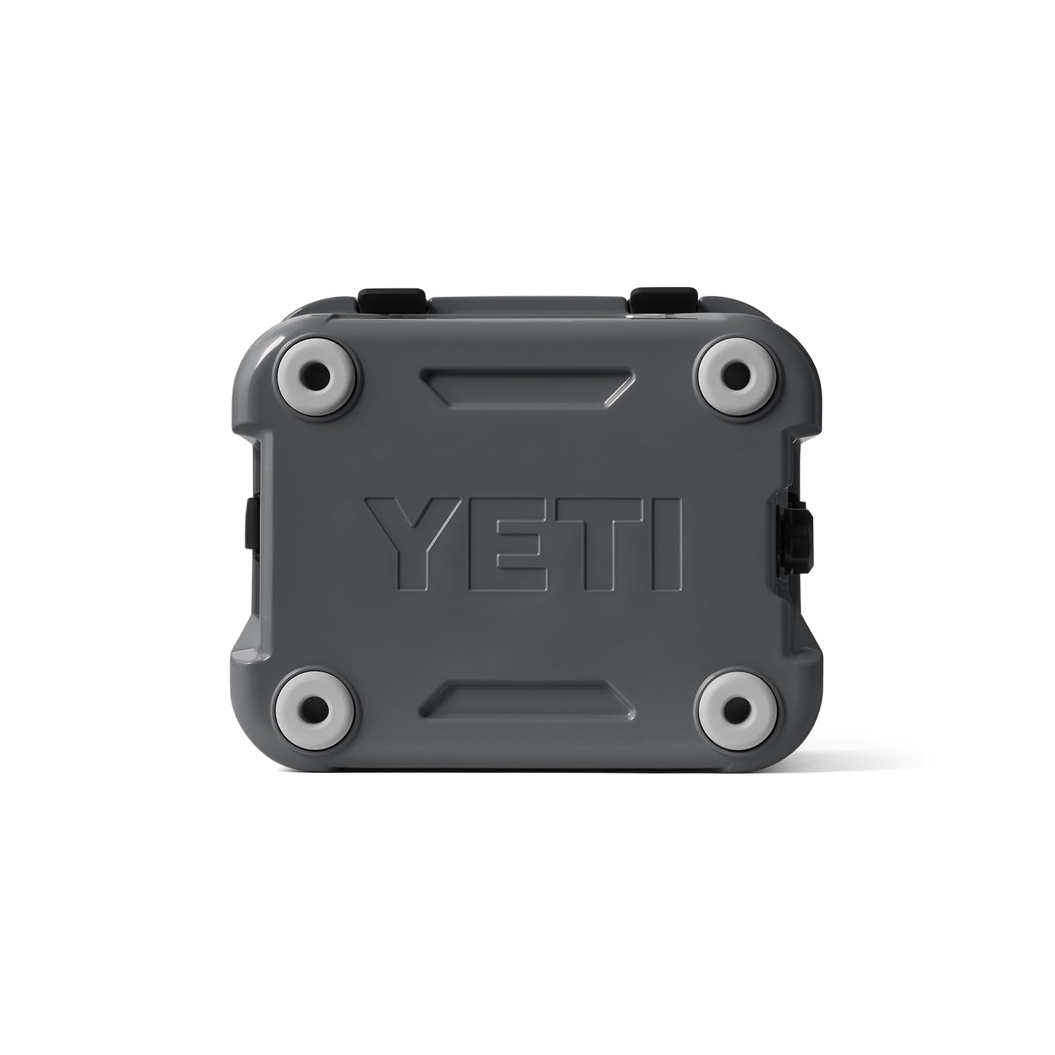 YETI Roadie 24 next to backpack showing size and scale for day-trip planning