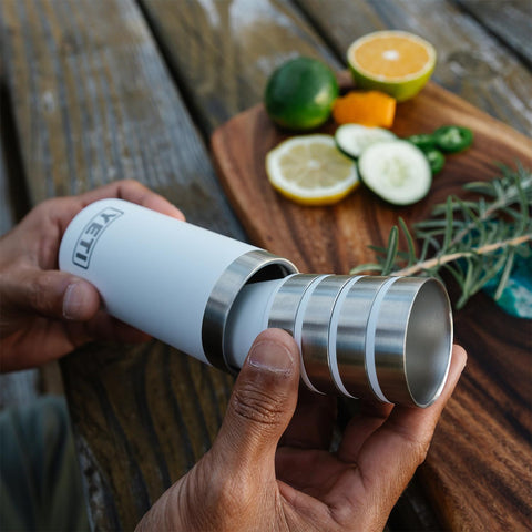 YETI shot glasses on a campsite table illustrating rugged outdoor use