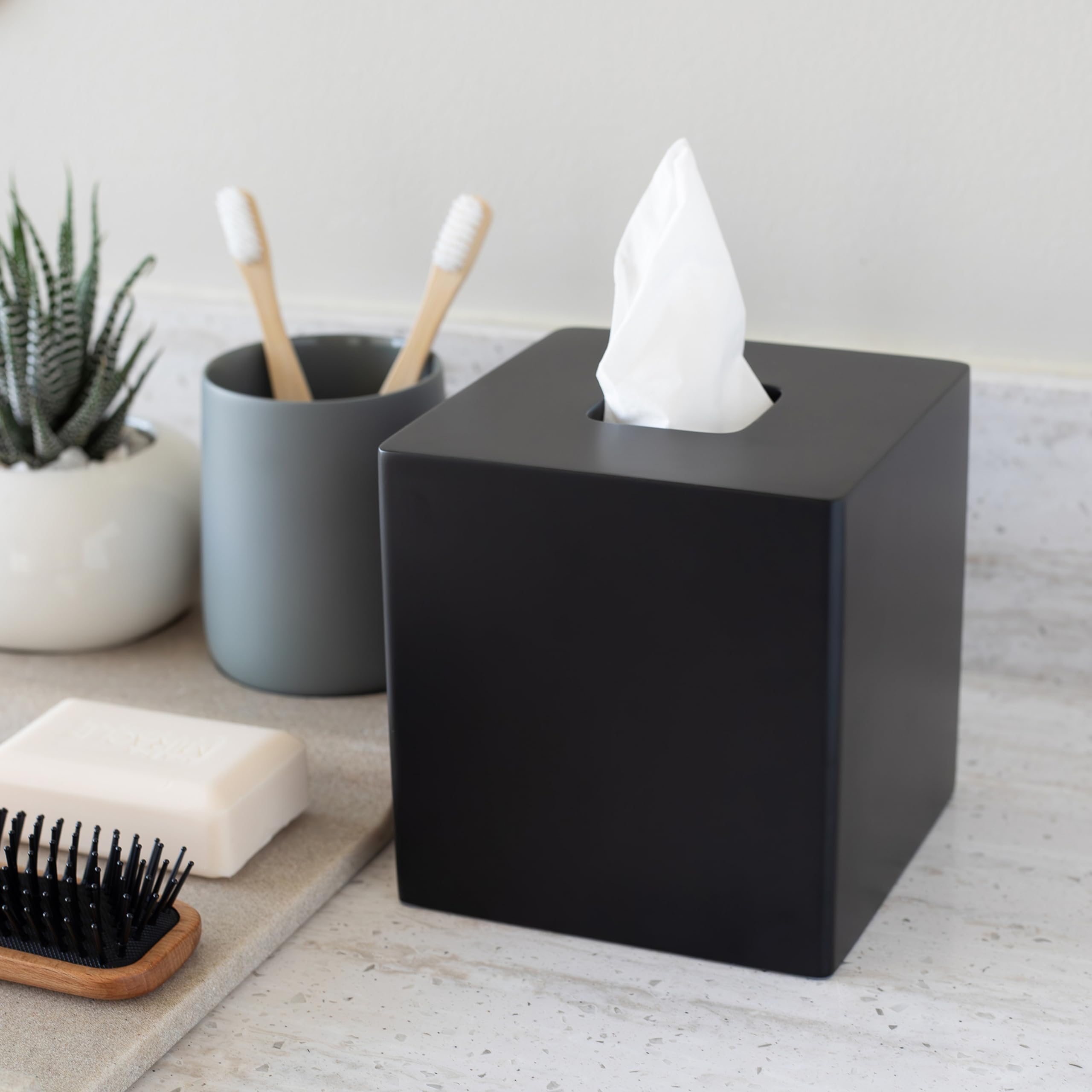 YEW DESIGN on bathroom counter improving decor and moisture resistance