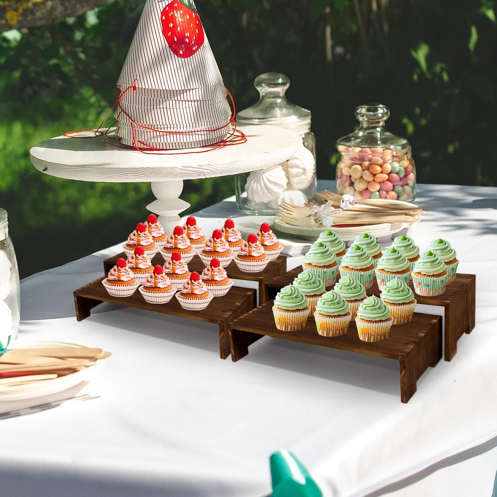 Yikaroeli wooden risers holding cupcakes to show organized bakery presentation