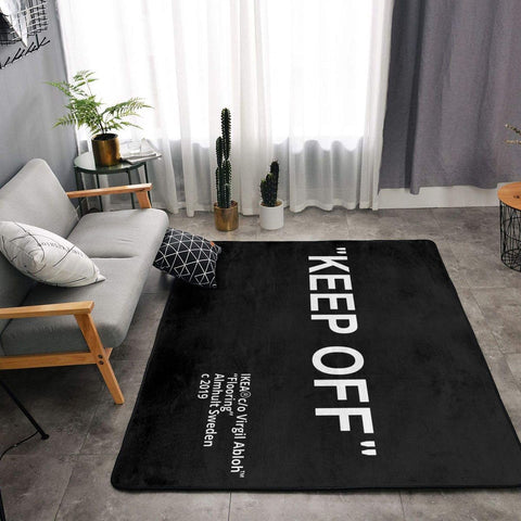 YIKUDU rug next to foot for size comparison and practical scale reference