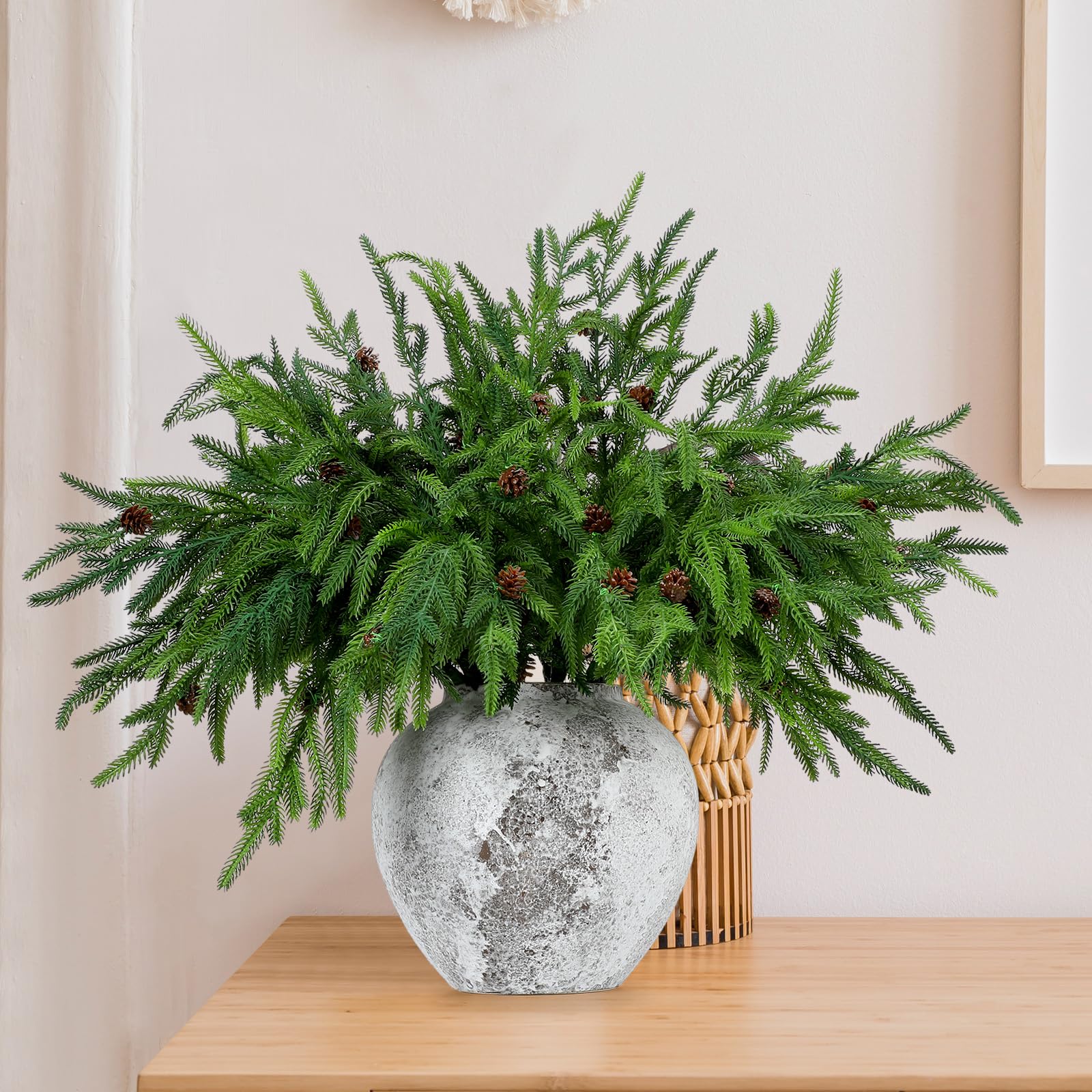Yinder branches styled as a mantel garland adding festive greenery and durable wear