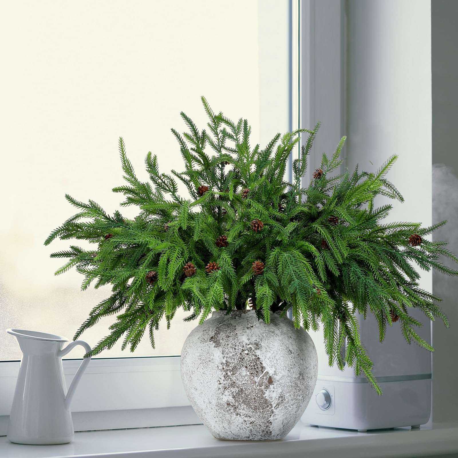 Yinder used in a table centerpiece providing fuller holiday decoration without maintenance