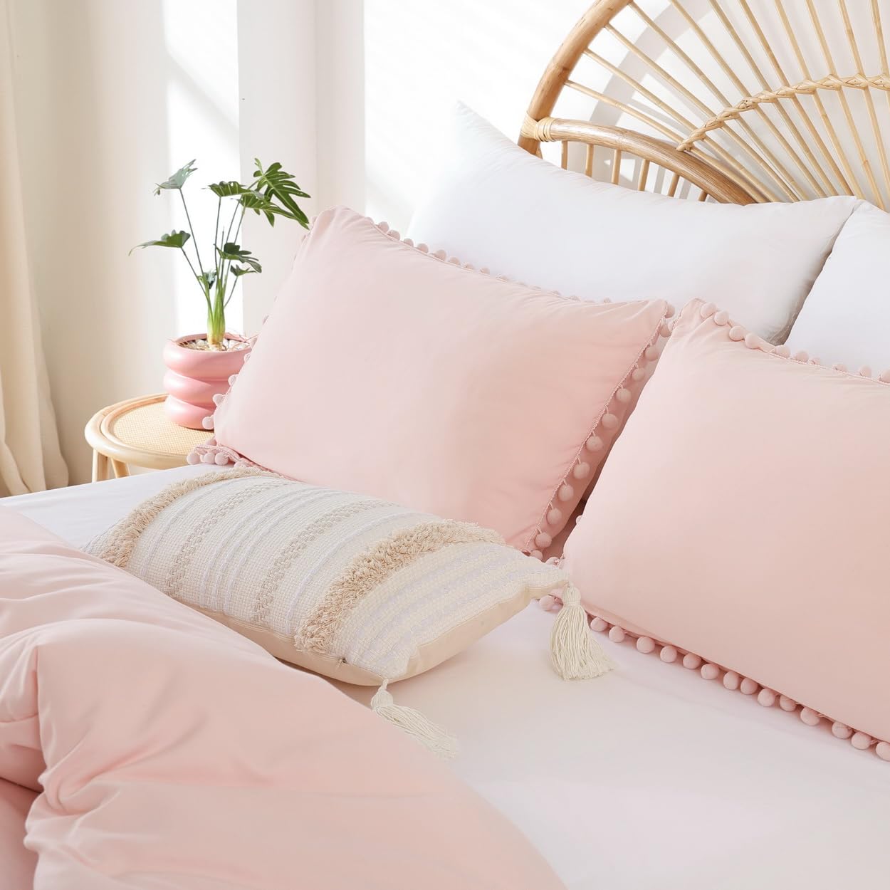 YIRDDEO pillowcases with pom accents displayed for matching set coordination