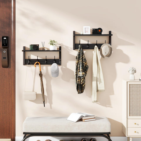 YMYNY wall-mounted rack in entryway clearing floor space and holding coats