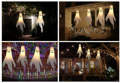 YOTNUS ghosts hanging in tree at night creating dramatic yard ambience