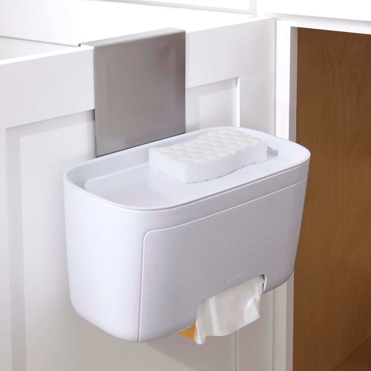 YouCopia DoorStash front view showing compact dispenser and space-saving benefit
