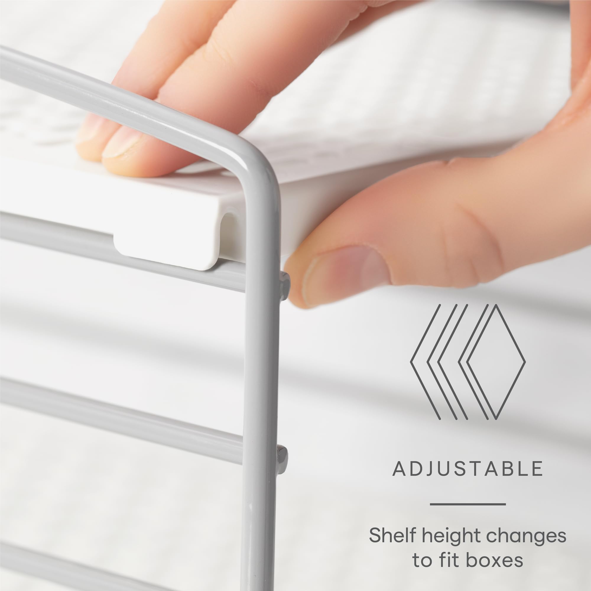 YouCopia shelf adjustment detail demonstrating flexible height for oversized boxes