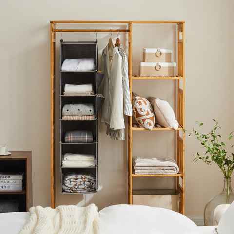 YOUDENOVA installed in closet with clothes demonstrating organized storage