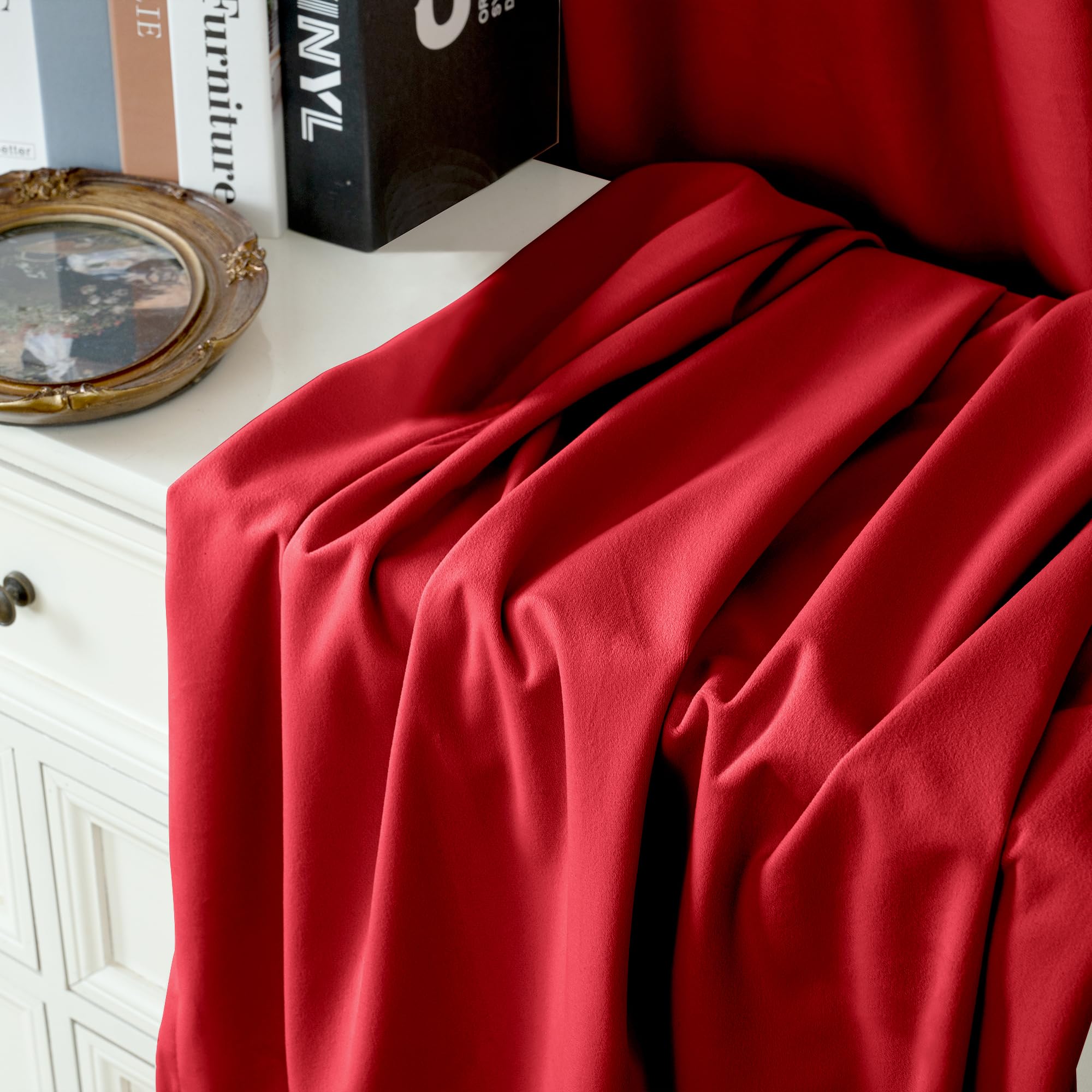 YoungsTex curtains next to sofa showing 84 inch length and real-room scale