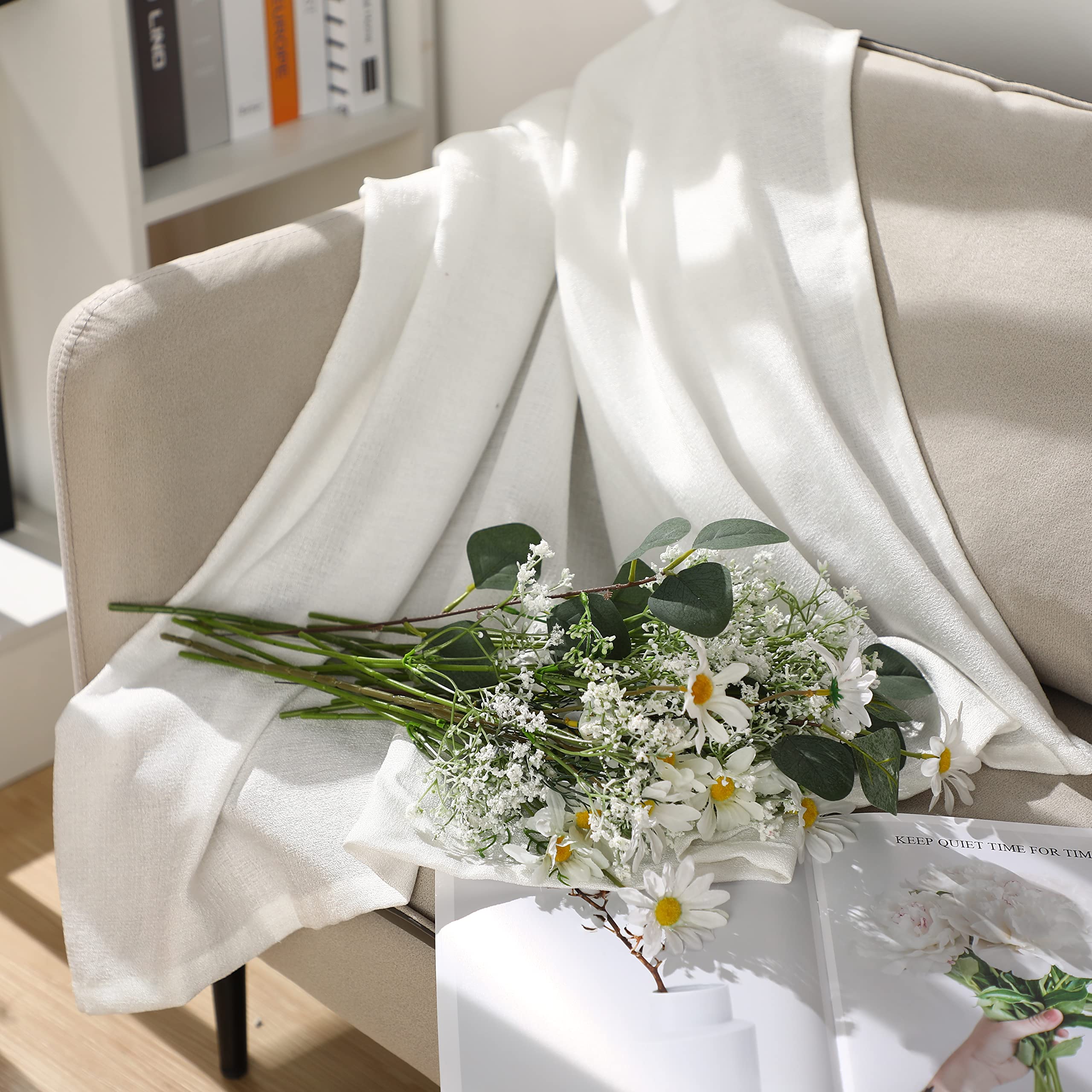 Ysleen arranged in a vase on a living room table adding maintenance-free natural style