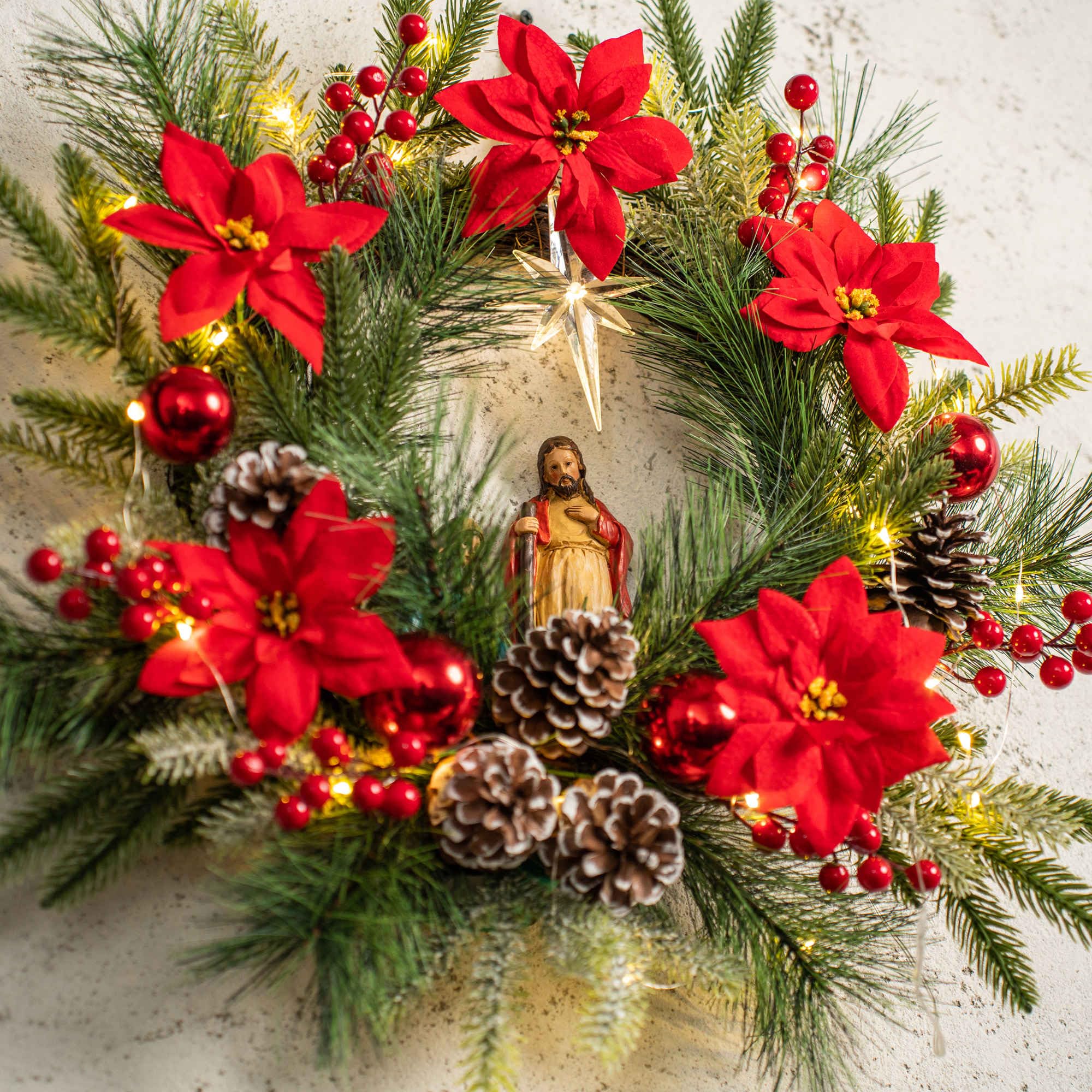 YULETIME pinecones and red berries detail adding natural seasonal accents
