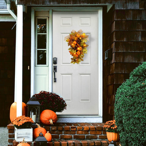 YULETIME swag hung on a front door demonstrating curbside seasonal style