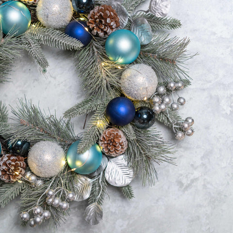 YULETIME wreath scale comparison showing 20-inch size and lightweight benefit