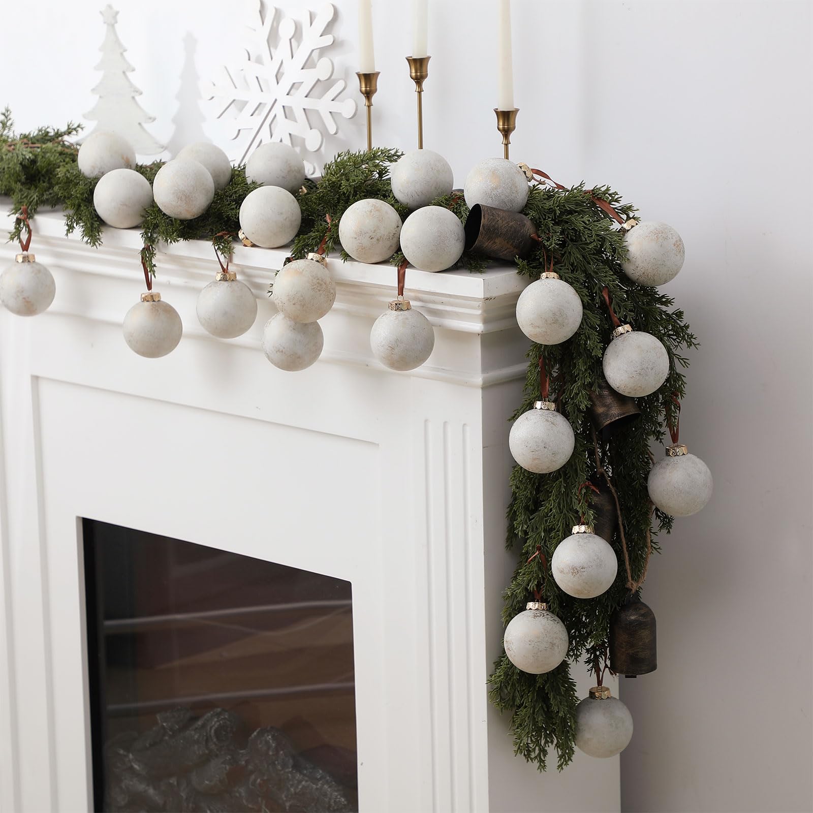 Yunlly ornament beside tape measure showing 3.15-inch size for scale and planning