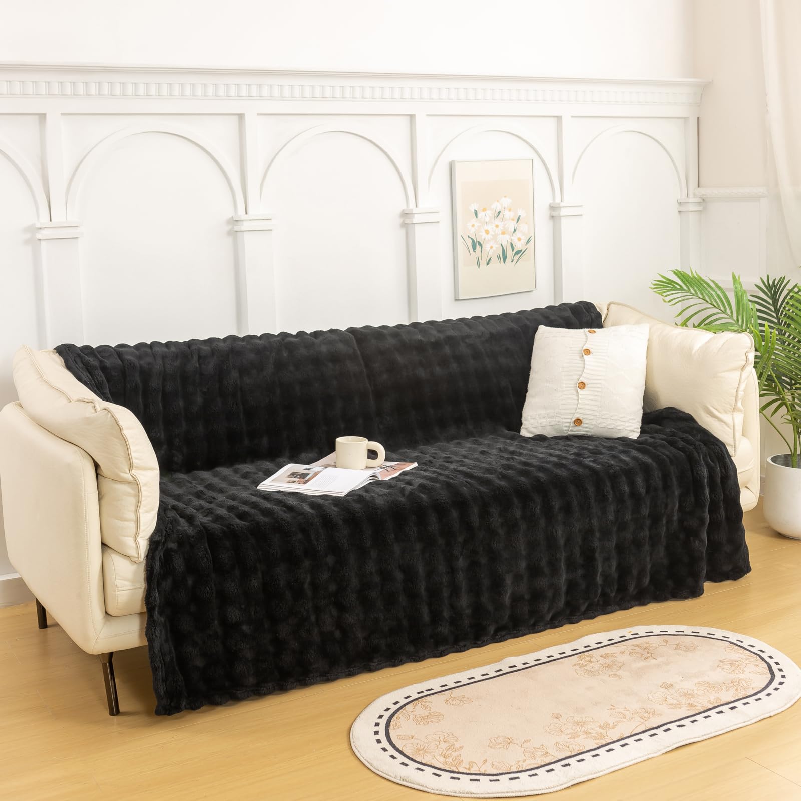 YUSOKI throw draped over sofa showing decorative uplift benefit